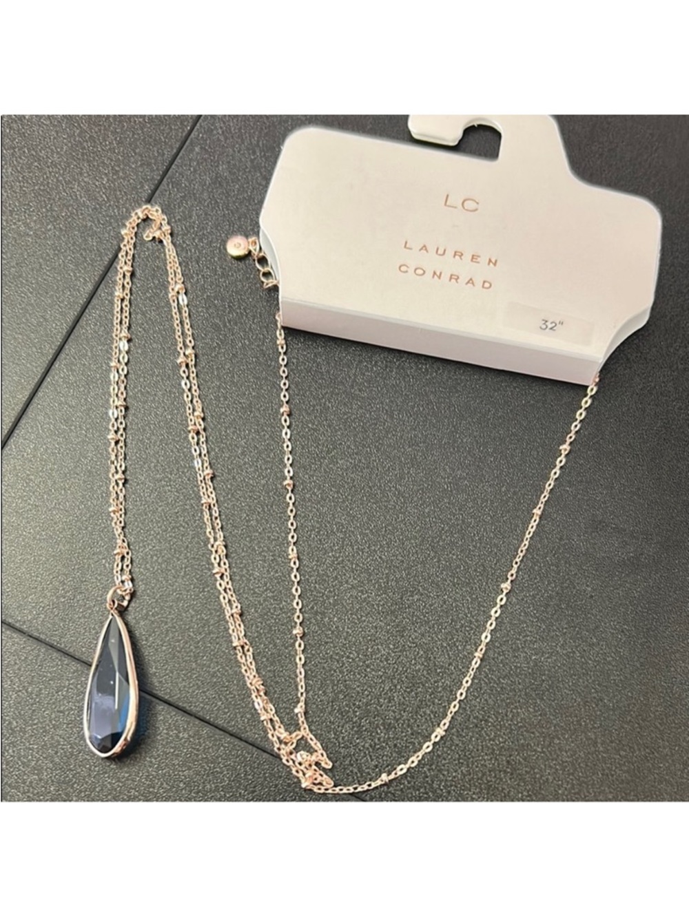 ⭐️ 5/$25
Gold Chain Necklace with Dark Blue Teardrop Pendant by Lauren Conrad - Picture 2 of 4